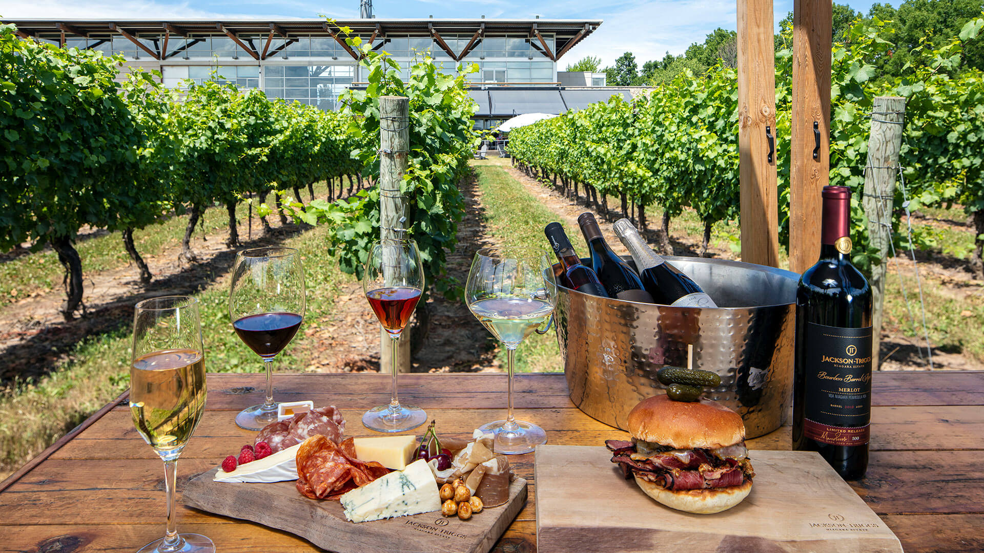 White, Red, Rose, and Sparkling Wine paired with a charcuterie board, and burger with a bottle of Jackson Triggs Bourbon Barrel Aged Merlot.  