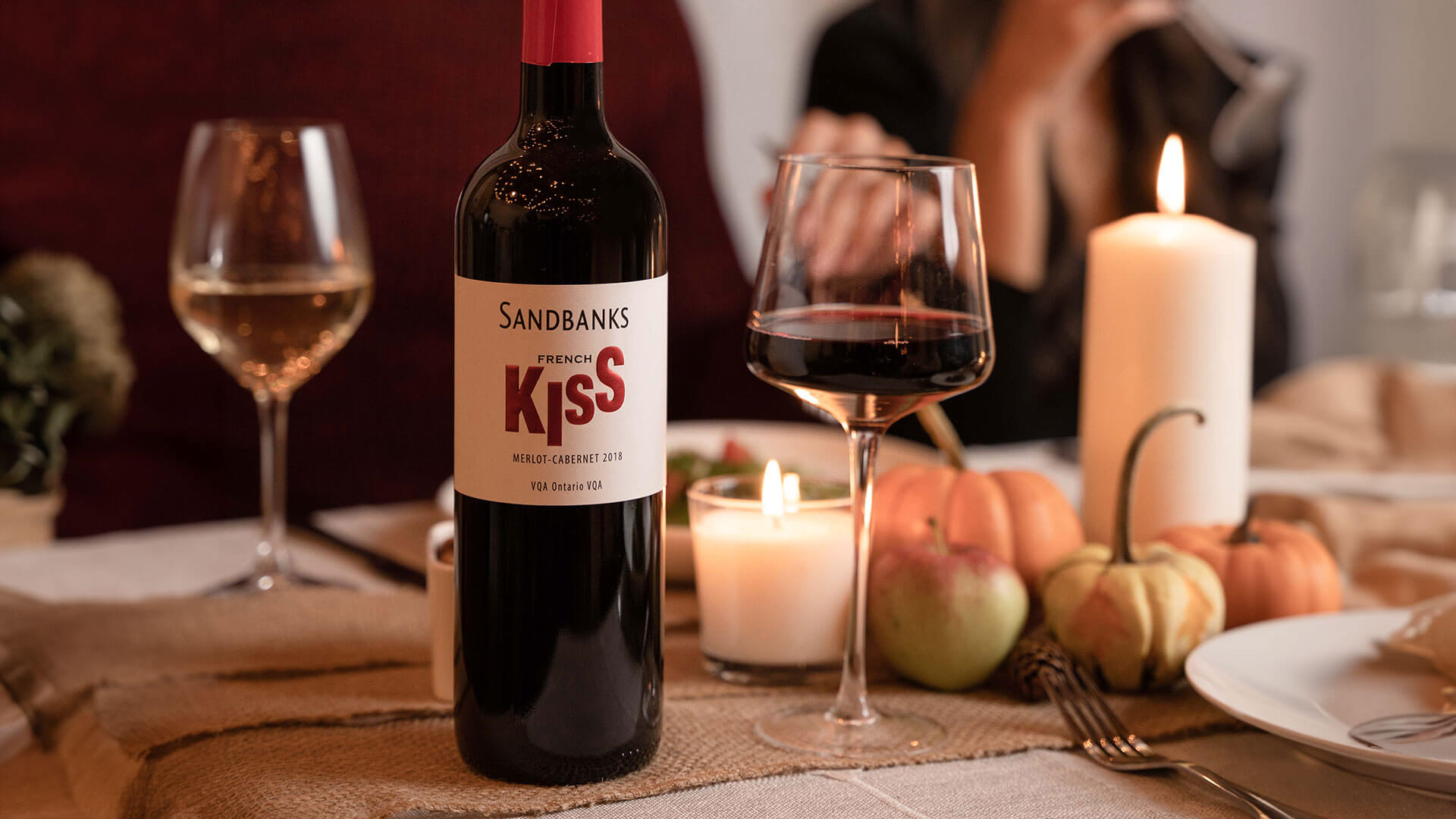 Bottle of Sandbanks French Kiss Merlot Cabernet VQA at Thanksgiving dinner.