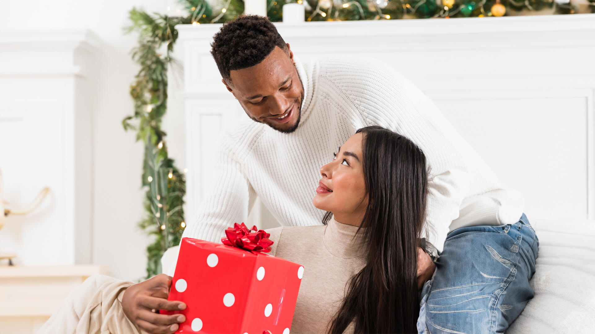 Couple exchanging a present.