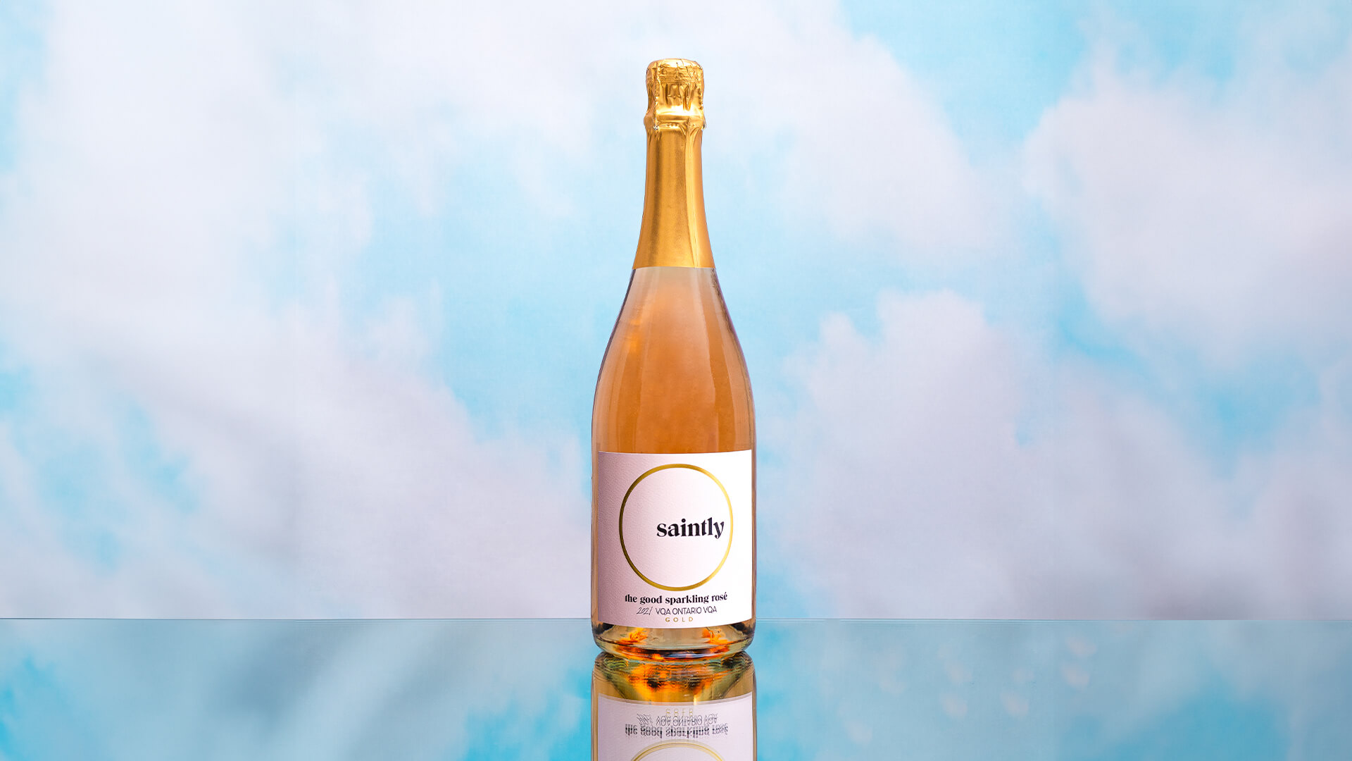 A bottle of Saintly the good sparkling rose.