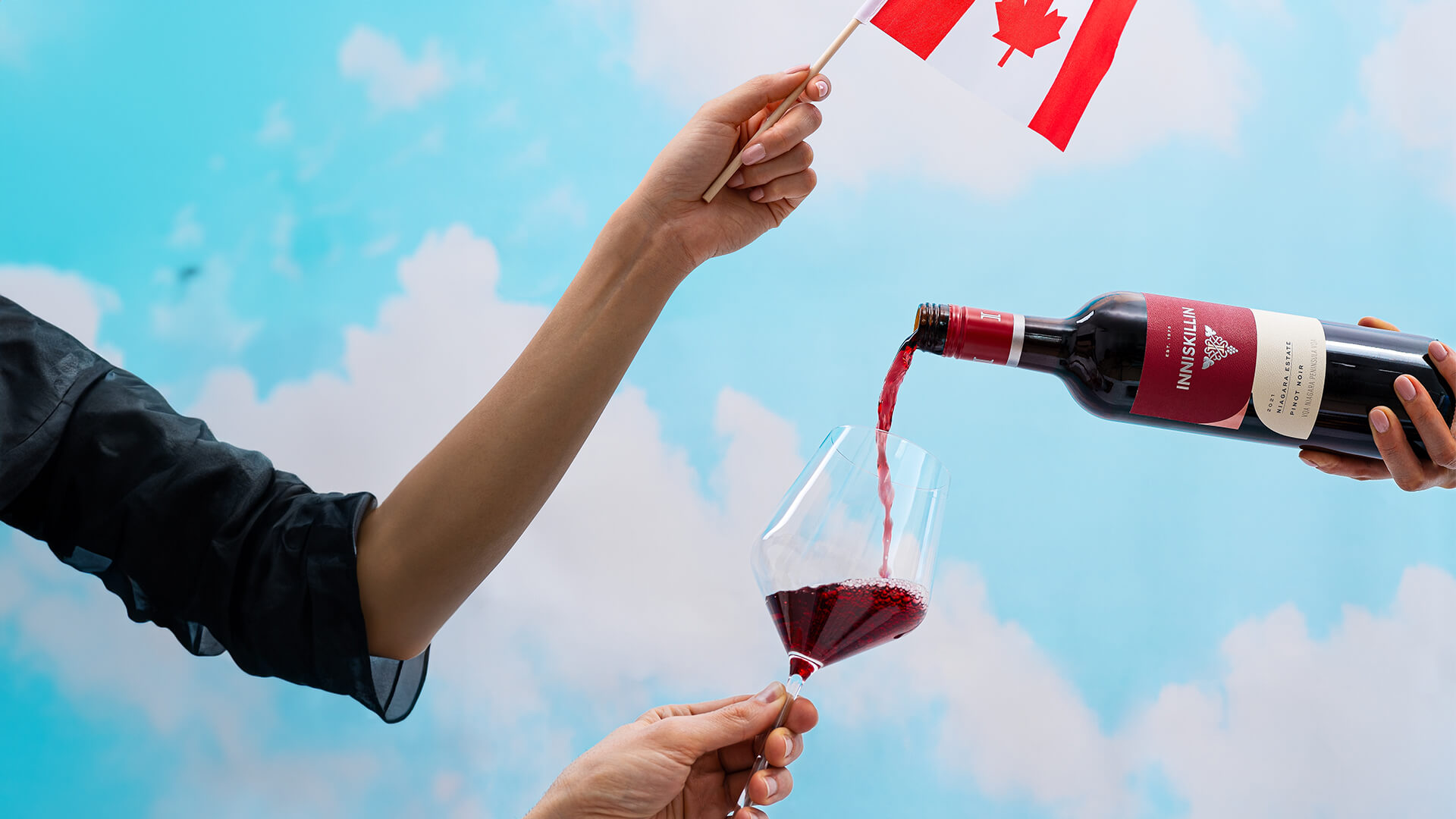 A bottle of Inniskillin red being poured.